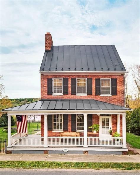 2 story farm house with metal roof|metal roofed farmhouse.